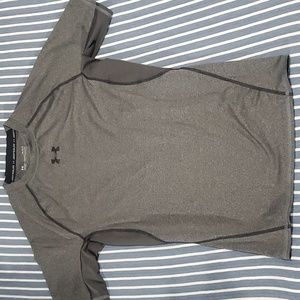 Grey short sleeve Under Armour heat gear compression shirt. Size large